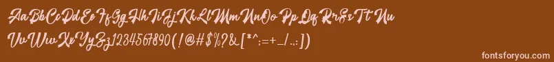 restyla Font – Pink Fonts on Brown Background