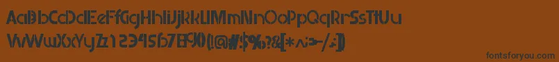 フォントRetailistic – 黒い文字が茶色の背景にあります