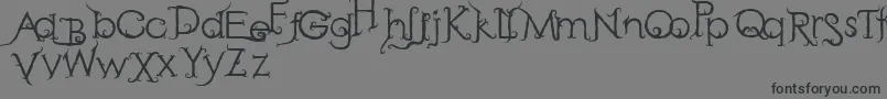 フォントRetakSeribu – 黒い文字の灰色の背景