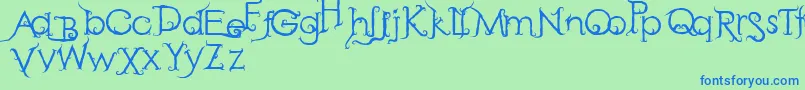RetakSeribu-fontti – siniset fontit vihreällä taustalla