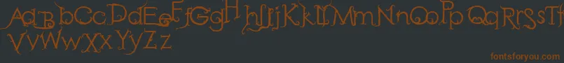 RetakSeribu Font – Brown Fonts on Black Background
