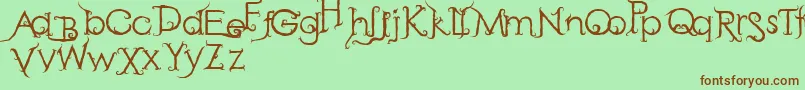 フォントRetakSeribu – 緑の背景に茶色のフォント