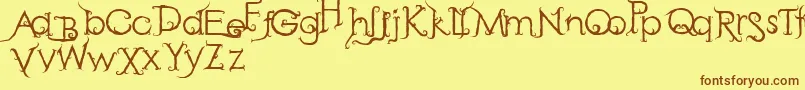 RetakSeribu-Schriftart – Braune Schriften auf gelbem Hintergrund