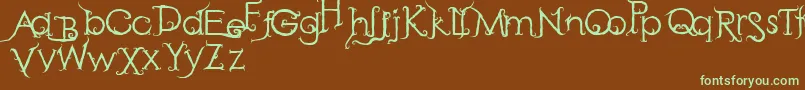 フォントRetakSeribu – 緑色の文字が茶色の背景にあります。