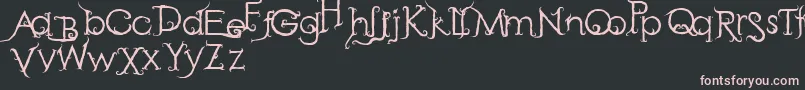 フォントRetakSeribu – 黒い背景にピンクのフォント