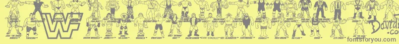 フォントRetro WWF Hasbro Figures – 黄色の背景に灰色の文字