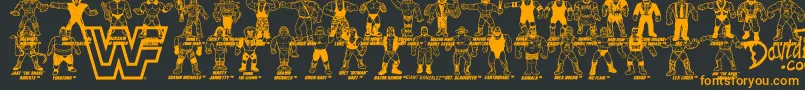 フォントRetro WWF Hasbro Figures – 黒い背景にオレンジの文字