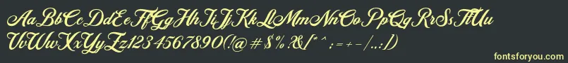 Retromark Script UNICODE Dafont Font – Yellow Fonts on Black Background