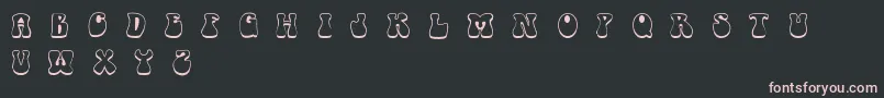 Czcionka Retrotype – różowe czcionki na czarnym tle