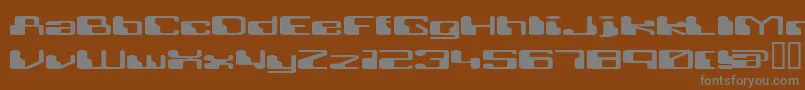 RETRRG  -fontti – harmaat kirjasimet ruskealla taustalla