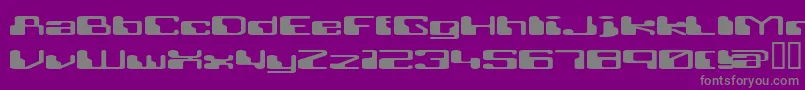 RETRRG  -fontti – harmaat kirjasimet violetilla taustalla