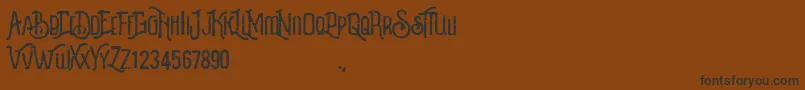 Revalina Font – Black Fonts on Brown Background