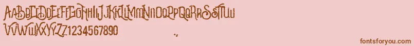 Revalina-Schriftart – Braune Schriften auf rosa Hintergrund