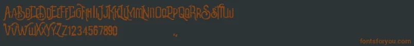 Шрифт Revalina – коричневые шрифты на чёрном фоне