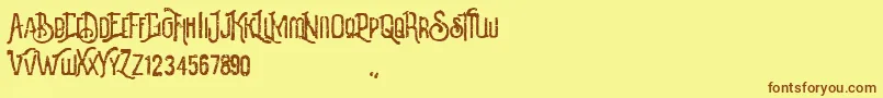 Revalina-fontti – ruskeat fontit keltaisella taustalla