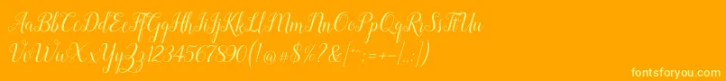 Revallyna Font – Yellow Fonts on Orange Background