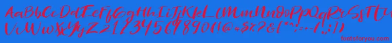 Revolution Brush Font-fontti – punaiset fontit sinisellä taustalla