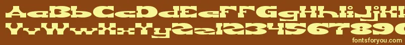 REVOLVER GUN Font – Yellow Fonts on Brown Background