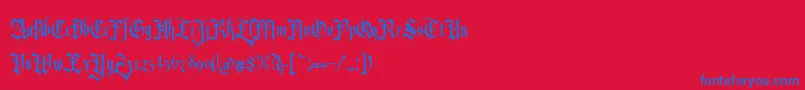 RevolverBlackletter Regular-Schriftart – Blaue Schriften auf rotem Hintergrund