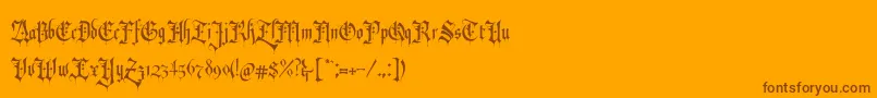 RevolverBlackletter Regular-Schriftart – Braune Schriften auf orangefarbenem Hintergrund