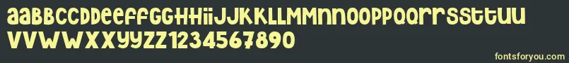 フォントRezdone – 黒い背景に黄色の文字