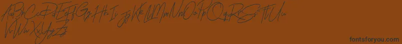 Rhesmanisa Demo Font – Black Fonts on Brown Background