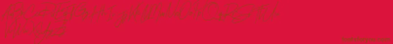 Rhesmanisa Demo Font – Brown Fonts on Red Background