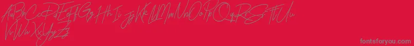 Rhesmanisa Demo Font – Gray Fonts on Red Background