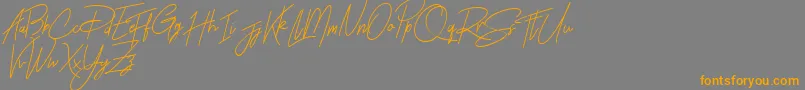 Rhesmanisa Demo Font – Orange Fonts on Gray Background