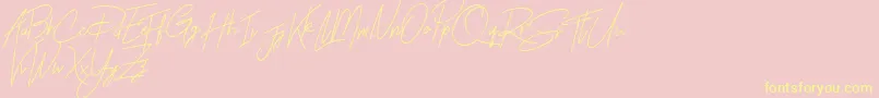 Rhesmanisa Demo Font – Yellow Fonts on Pink Background