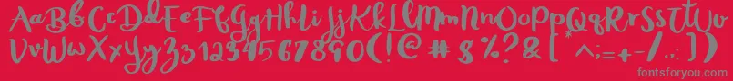 Czcionka Rheydo Regular – szare czcionki na czerwonym tle