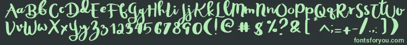 Rheydo Regular Font – Green Fonts on Black Background