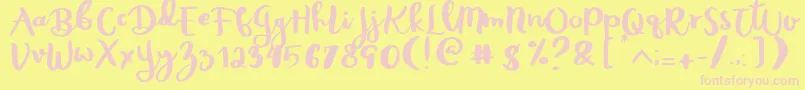 Rheydo Regular Font – Pink Fonts on Yellow Background