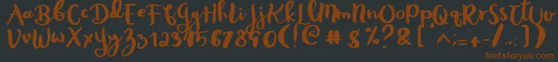 Rheydo Regular Font – Brown Fonts on Black Background