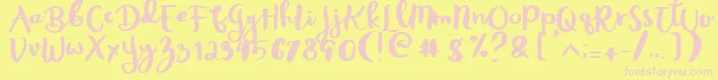 Rheydo Regular Font – Pink Fonts on Yellow Background