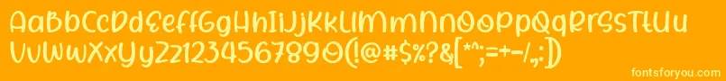 Rhigen Font by 7NTypes Font – Yellow Fonts on Orange Background