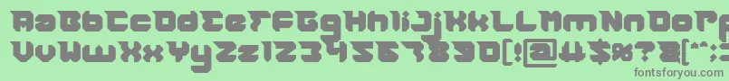 フォントRHINOCEROS Break THE Wall Bold – 緑の背景に灰色の文字