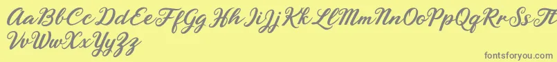 Rhyanie Lane Font – Gray Fonts on Yellow Background