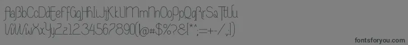 フォントRiasAltasRibadeoLGtipos Nor – 黒い文字の灰色の背景