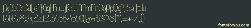 フォントRiasAltasRibadeoLGtipos Nor – 黒い背景に黄色の文字