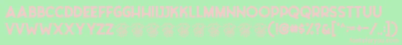 Riborn Stamp Demo-fontti – vaaleanpunaiset fontit vihreällä taustalla