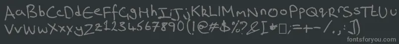 フォントRich s Riting – 黒い背景に灰色の文字