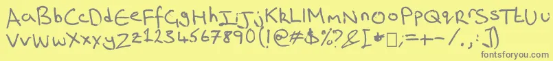 フォントRich s Riting – 黄色の背景に灰色の文字