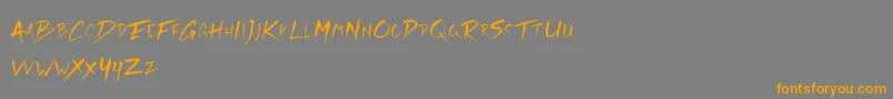 Rickies Free-Schriftart – Orangefarbene Schriften auf grauem Hintergrund