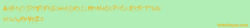 Czcionka Rickies Free – pomarańczowe czcionki na zielonym tle