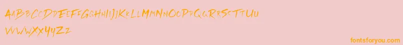 フォントRickies Free – オレンジの文字がピンクの背景にあります。
