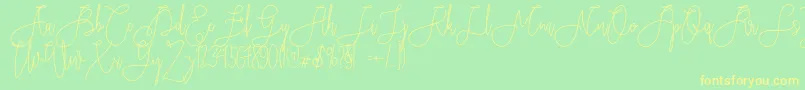 Rieesflomeo Font – Yellow Fonts on Green Background