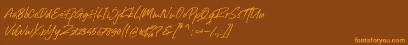 フォントRight Gilligant Font – オレンジ色の文字が茶色の背景にあります。