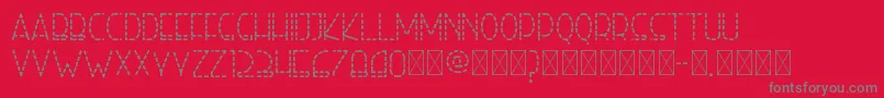 righthand regulardash personal-Schriftart – Graue Schriften auf rotem Hintergrund