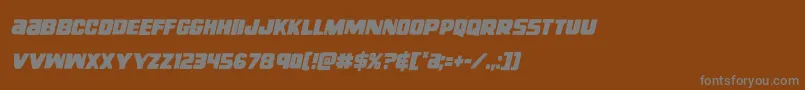 フォントrighthandlukecondital – 茶色の背景に灰色の文字